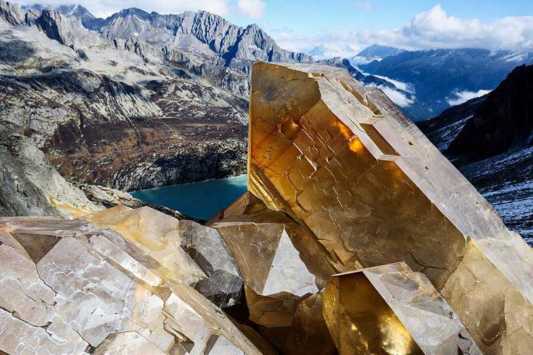 Unusually large quartz stone with mountain panorama behind